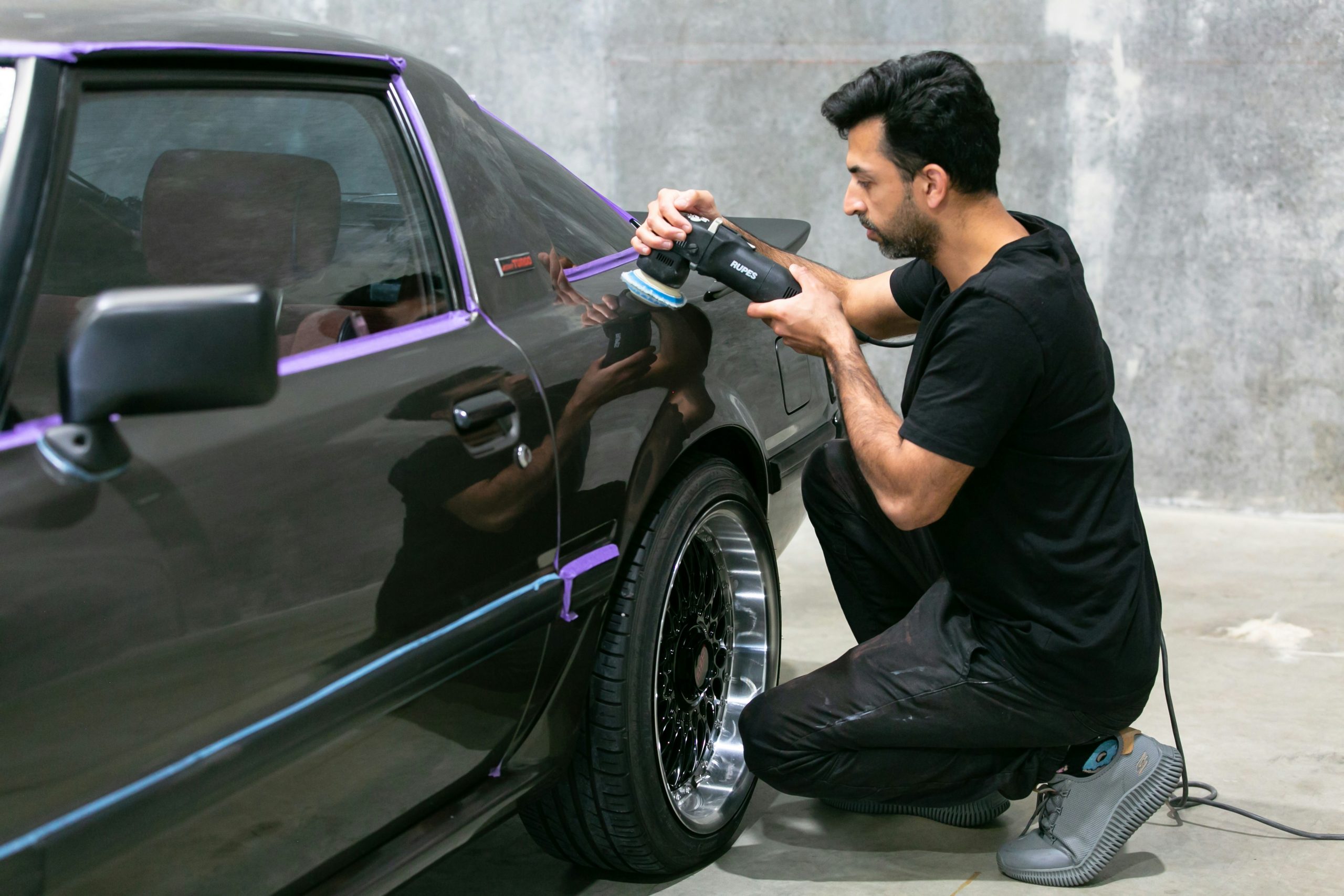 A mobile detailer working on a car in Fishkill, NY
